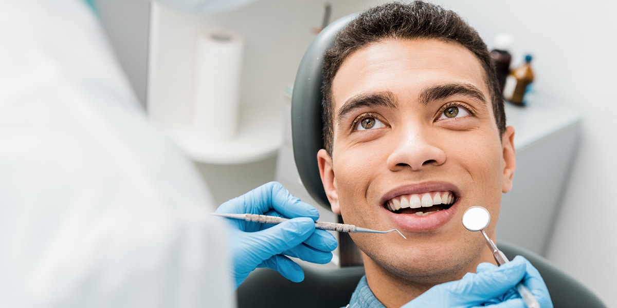 Man during an wisdom tooth extraction consolation in Milwaukee WI